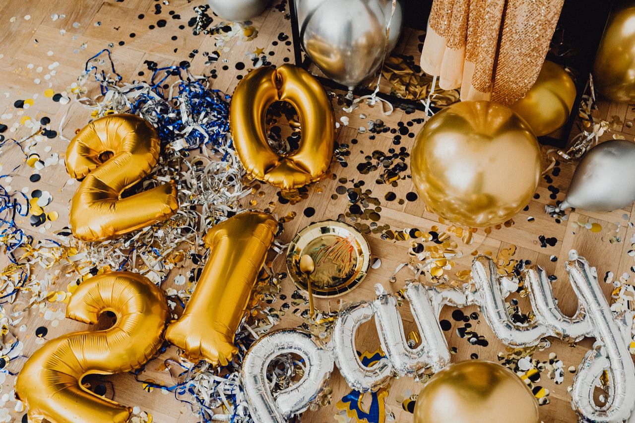 Colorful balloons and confetti for a vibrant New Year celebration.
